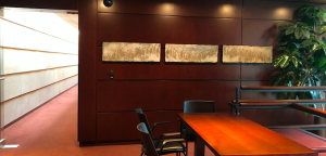 the artwork sits above a table