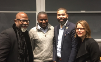 organizers stand with the mayor